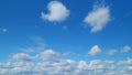 Beautiful sky background with picturesque cirrus and cumulus on different layers clouds. Blue sky called mare s tails Royalty Free Stock Photo