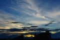 beautiful sky and cloud when sunset over city. silhouette of town when sunset at dusk with dramatic twilight sun light over sky Royalty Free Stock Photo