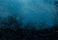 Sky and clouds, rain, wet glass, drops of water on the glass, drops of water on the window, drops Royalty Free Stock Photo