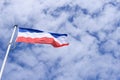 National Dutch Flag with blue cloudy sky Royalty Free Stock Photo