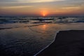 Beautiful sky colorful sunset on the ocean, natural landscapes. Deserted beach, the sun sets in the clouds above the sea Royalty Free Stock Photo