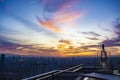 Beautiful sky and Jakarta cityscape at sunset from a rooftop cafe