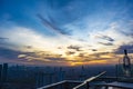 Beautiful sky and Jakarta cityscape at sunset from a rooftop cafe