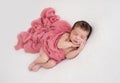 Beautiful sleeping newborn lying on side