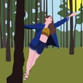 Beautiful slender girl dancing in a pine forest. Modern young woman enjoys summer
