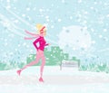 Beautiful slim girl running in winter