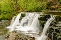 A beautiful slow motion long shutter speed waterfall in Wales forest. Breacons Beacon - UK, England Royalty Free Stock Photo