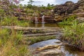 Beautiful and small cascade among the rocks and vegetation of the Biribiri environmental reserve Royalty Free Stock Photo