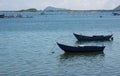 Beautiful small fishing boats and fisher man on the sea with blue sky background and southeast asia bay part 5 Royalty Free Stock Photo