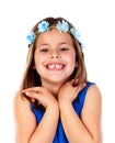 Beautiful small girl with blue dress and a flowersÃÂ´ wreath on h Royalty Free Stock Photo