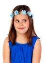 Beautiful small girl with blue dress and a flowersÃÂ´ wreath on h Royalty Free Stock Photo