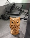 Wodden owl sculpture on a table