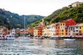 Beautiful small village Portofino with colorfull houses, luxury boats and yachts in little bay harbor. Liguria, Italy Royalty Free Stock Photo