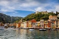 Beautiful small village Portofino with colorfull houses, luxury boats and yachts in little bay harbor. Liguria, Italy Royalty Free Stock Photo