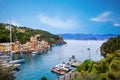 Beautiful small village Portofino with colorfull houses, luxury boats and yachts in little bay harbor. Liguria, Italy Royalty Free Stock Photo