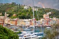 Beautiful small village Portofino with colorfull houses, luxury boats and yachts in little bay harbor. Liguria, Italy Royalty Free Stock Photo