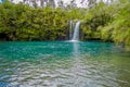 Beautiful small waterfall with a gorgeous turquoise water lake located in Petrohue, Llanquihue Province, Los Lagos