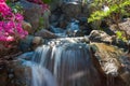 Beautiful small waterfall in a japanese style garden Royalty Free Stock Photo