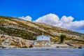 Beautiful littlewhite church on top of the hill in Greece Royalty Free Stock Photo