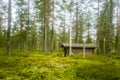 A beautiful small wooden building in the middle of Finnish forest Royalty Free Stock Photo