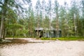 A beautiful small wooden building in the middle of Finnish forest Royalty Free Stock Photo