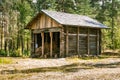 A beautiful small wooden building in the middle of Finnish forest Royalty Free Stock Photo