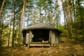 A beautiful small wooden building in the middle of Finnish forest Royalty Free Stock Photo