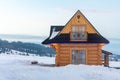 Cute house in the mountains in winter Royalty Free Stock Photo