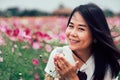 Beautiful smile asian woman in the cosmos field.Vintage Style Royalty Free Stock Photo