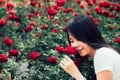 Beautiful smile asian woman in the rose field.Vintage Style Royalty Free Stock Photo