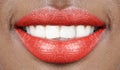 Beautiful smile african woman mouth lips with red lipstick and white teeth Royalty Free Stock Photo