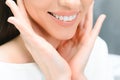 Beautiful Smile With White Teeth. Closeup Of Smiling Woman Mouth With Natural Plump Full Lips And Healthy Perfect Smile