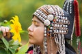 Beautiful smile young hill tribe girl in sunflowers garden. Royalty Free Stock Photo