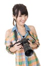 Beautiful smiling asian woman with photo camera