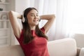 Beautiful Smiling Asian Woman In Wireless Headphones Listening Music At Home, Royalty Free Stock Photo