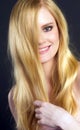 Beautiful Smiling Blond Woman Grooming Brushing Her Hair