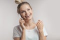 Beautiful smiling blond woman talking by cell mobile phone. Closeup. . Royalty Free Stock Photo