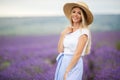 Beautiful smiling blonde girl on the lavender field, summer time Royalty Free Stock Photo