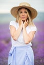 Beautiful smiling blonde girl on the lavender field Royalty Free Stock Photo