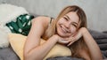 Beautiful smiling blonde in green pajamas. Good morning concept Royalty Free Stock Photo