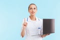 Beautiful blonde woman doctor wearing uniform standing Royalty Free Stock Photo