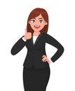 Beautiful smiling business woman showing thumbs up sign / gesture. Like, agree, approve, positive.