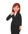 Beautiful smiling business woman showing thumbs up sign / gesture. Like, agree, approve, positive. Royalty Free Stock Photo