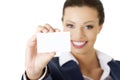 Beautiful smiling businesswoman with businesscard. Royalty Free Stock Photo