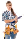 Beautiful smiling caucasian female worker with tools holding and Royalty Free Stock Photo