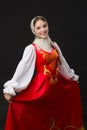 Beautiful smiling caucasian girl in russian folk costume Royalty Free Stock Photo