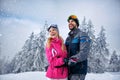 Beautiful smiling couple enjoying in winter vacations Royalty Free Stock Photo