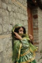 Beautiful smiling curly girl in Azeri national costume