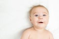 Beautiful smiling cute baby. Close-up portrait of a happy crawling baby looking at camera Royalty Free Stock Photo