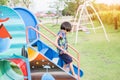 Beautiful smiling cute girl on a playground Royalty Free Stock Photo